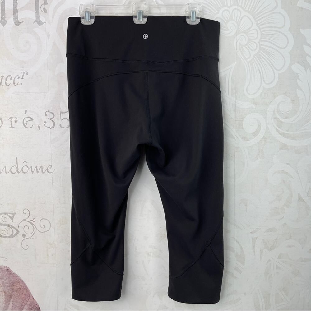 Lululemon In Movement Crop *Everlux 19" Black (First Release) Like New Size 12